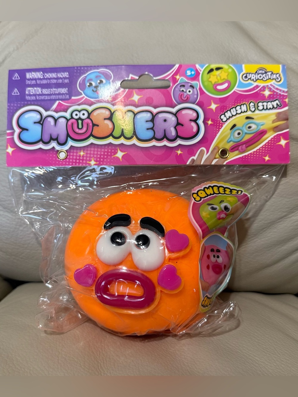 NEW ORB Curiosities Smushers Squishy Toy Orange with Red Lips Pink Hearts